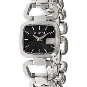 Gucci women’s silver watch